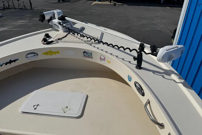 Slide: The Image of Bow of a 2011 Parker 2300 Special Edition boat with trolling motor and decals. - 10