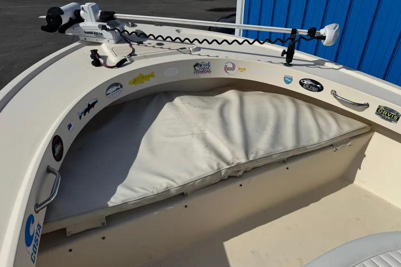 Slide: The Image of 2011 Parker 2300 Special Edition boat interior with stickers and trolling motor. - 16