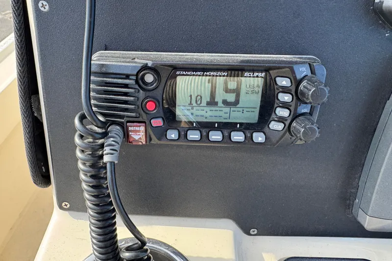 Slide: The Image of Marine radio on Parker 2300 Special Edition boat dashboard, displaying channel 19. - 20