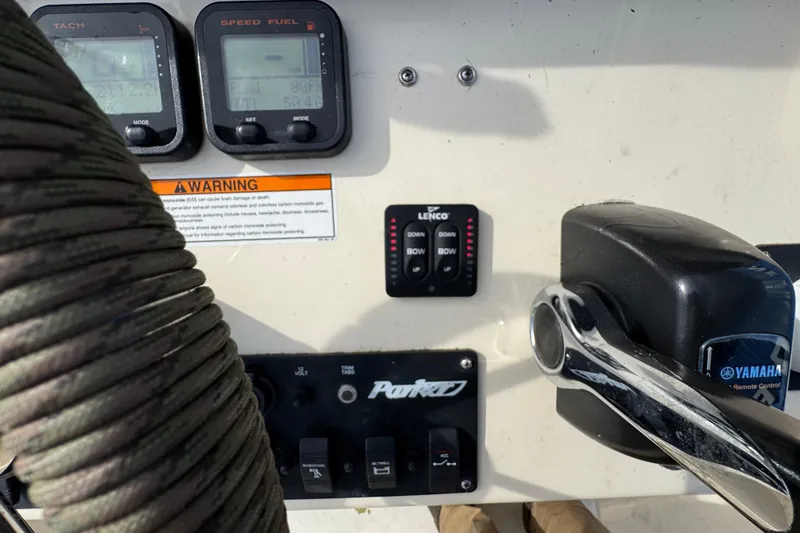 Slide: The Image of Control panel of a 2011 Parker 2300 Special Edition boat with Yamaha remote control. - 27