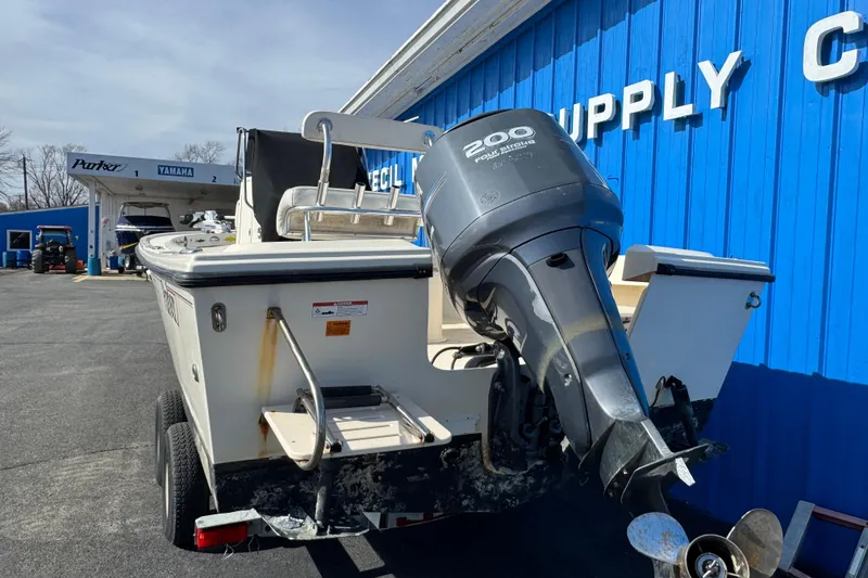 Slide: The Image of 2011 Parker 2300 Special Edition boat with Yamaha engine at a supply center. - 4