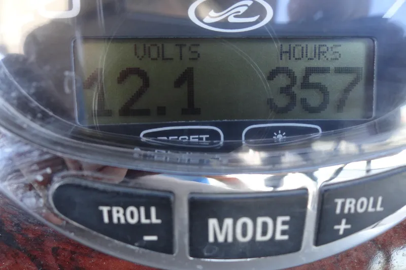 Slide: The Image of Close-up of Sea Ray Sundancer 280 dashboard showing 12.1 volts and 357 hours. - 11