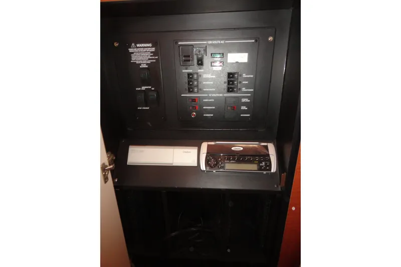 Slide: The Image of Electrical control panel of a 2004 Sea Ray Sundancer 280 boat. - 29