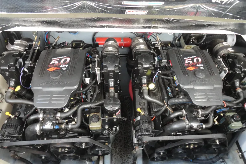 Slide: The Image of Twin MerCruiser 5.0 MPI engines in a 2004 Sea Ray Sundancer 280 boat. - 33
