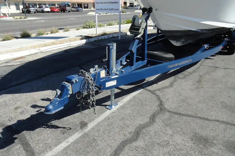 Slide: The Image of Trailer for 2004 Sea Ray Sundancer 280 boat parked on asphalt. - 36