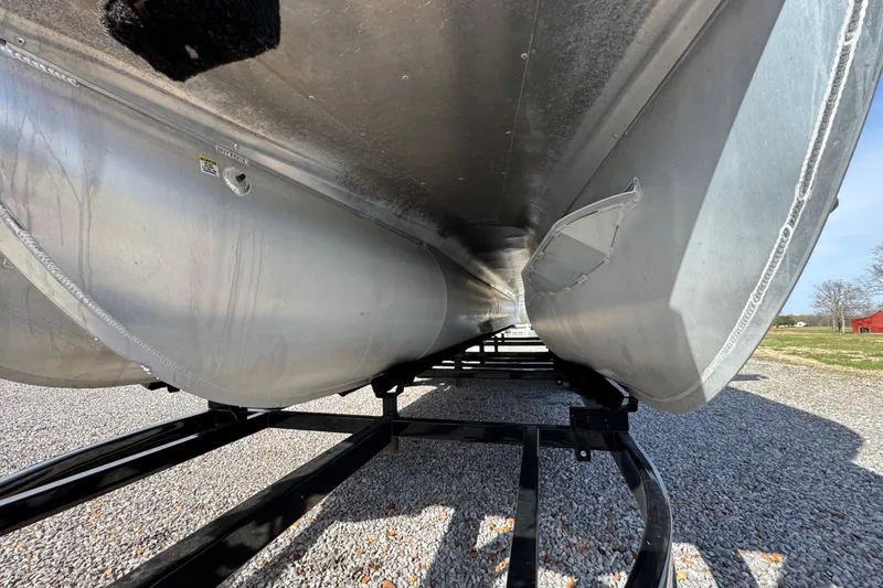 Slide: The Image of Underneath view of 2024 Trifecta 25ULE SS pontoon boat on trailer. - 27