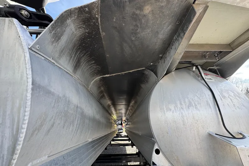Slide: The Image of Underneath view of 2024 Trifecta 25ULE SS pontoon boat, showcasing aluminum structure. - 35