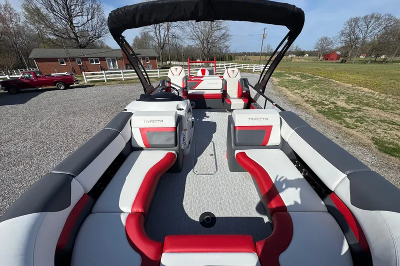 Slide: The Image of 2024 Trifecta 25ULE SS pontoon boat with stylish seating and modern design. - 45