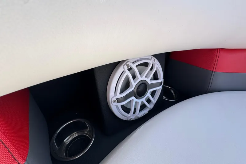 Slide: The Image of 2024 Trifecta 25ULE SS boat interior with speaker and cup holders. - 48