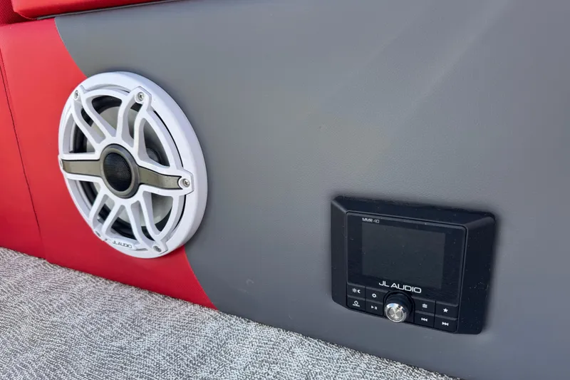 Slide: The Image of 2024 Trifecta 25ULE SS boat with JL Audio speaker and control panel. - 53