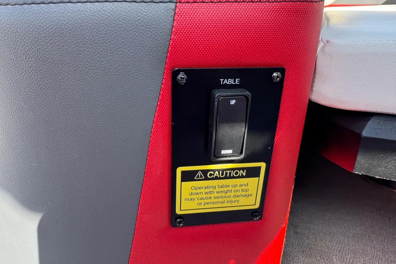 Slide: The Image of Control panel for table adjustment on 2024 Trifecta 25ULE SS boat. - 54