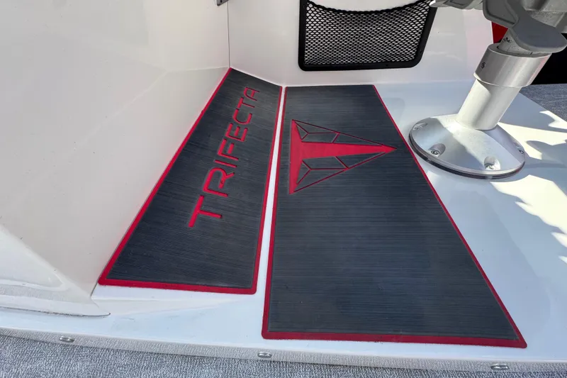 Slide: The Image of 2024 Trifecta 25ULE SS boat deck with branded non-slip mats. - 75