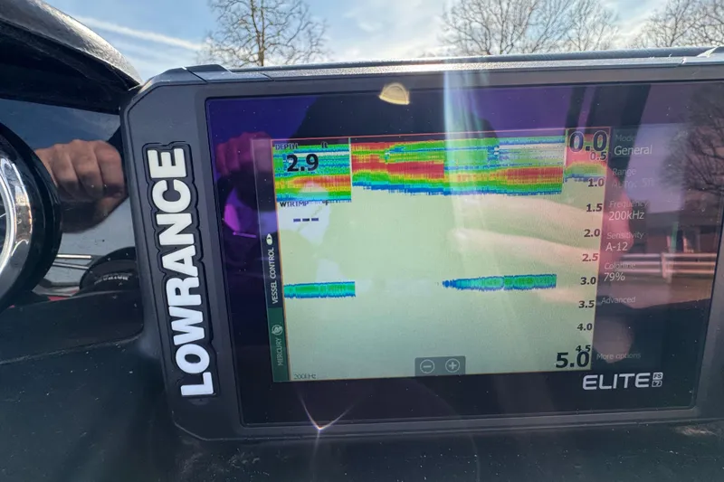 Slide: The Image of Lowrance Elite FS 7 fish finder display on Trifecta 25ULE SS, 2024 model. - 78