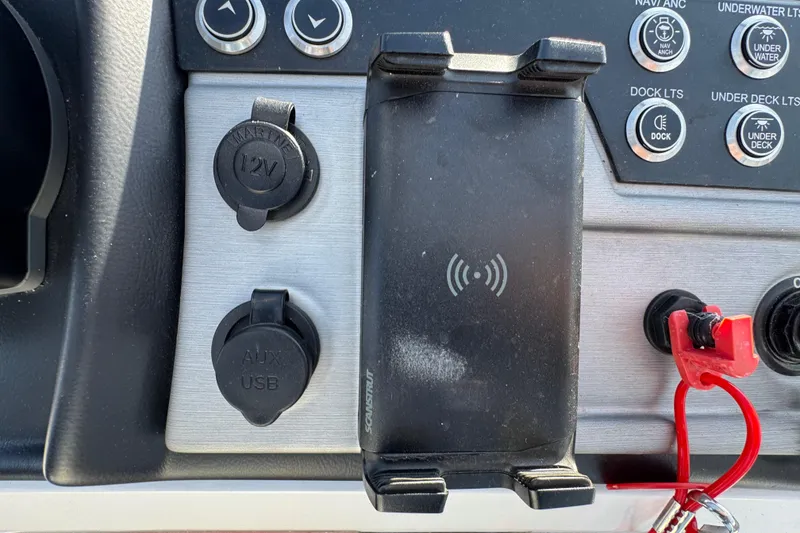 Slide: The Image of Control panel of 2024 Trifecta 25ULE SS with USB, 12V ports, and wireless charging. - 85