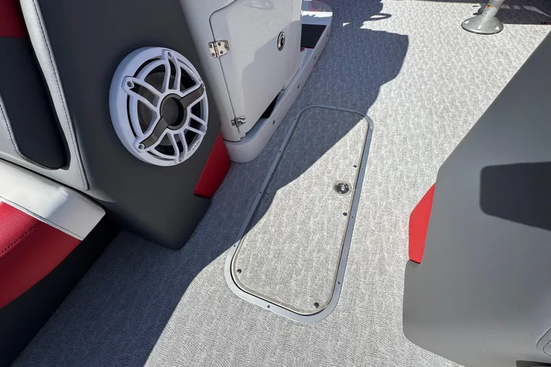 Slide: The Image of Interior of 2024 Trifecta 25ULE SS boat with speaker and storage compartment. - 89