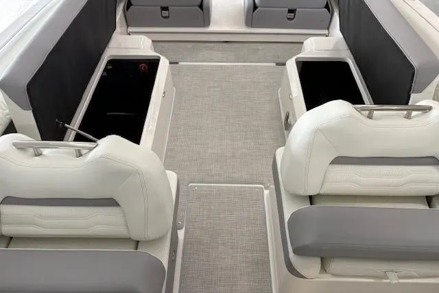 Slide: The Image of Interior of 2026 Regal LX6 boat with spacious seating and storage compartments. - 10