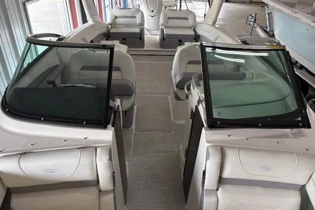 Slide: The Image of 2026 Regal LX6 boat interior with spacious seating and modern design. - 15