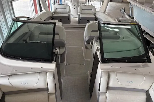 Slide: The Image of 2026 Regal LX6 boat interior with spacious seating and modern design. - 16