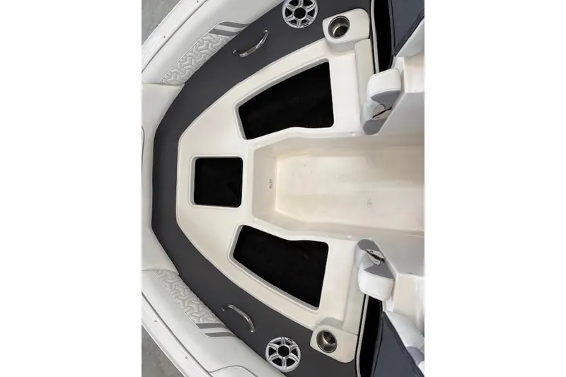 Slide: The Image of 2026 Regal LX2 boat interior with sleek seating and modern design. - 10