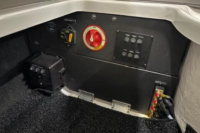 Slide: The Image of Electrical control panel of 2026 Regal LX2 boat, featuring switches and wiring. - 11