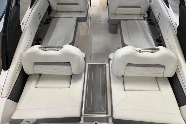 Slide: The Image of Luxurious interior of 2026 Regal LX2 boat with white seating and modern design. - 3