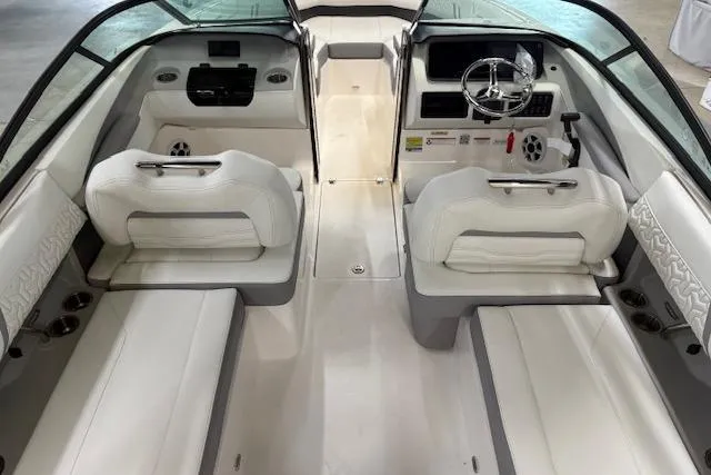 Slide: The Image of 2026 Regal LX2 boat interior with white seating and modern dashboard design. - 4