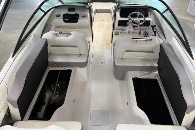 Slide: The Image of 2026 Regal LX2 boat interior with white seating and modern dashboard design. - 8