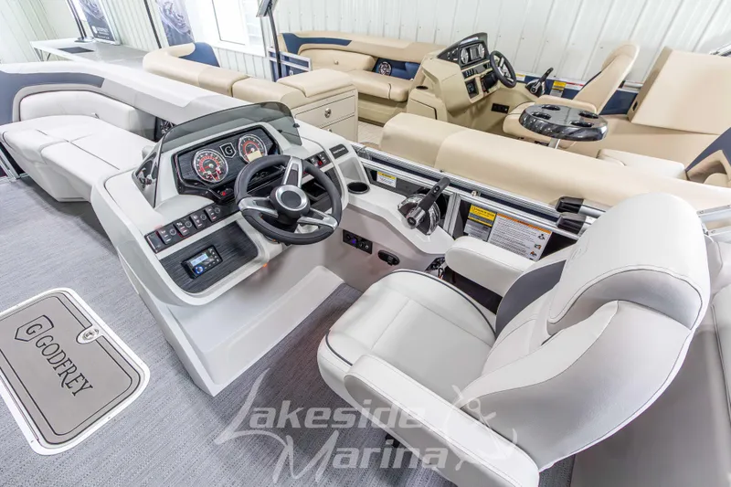 Slide: The Image of Interior of 2026 Godfrey Sweetwater 2286 SBC pontoon boat with modern helm and seating. - 15
