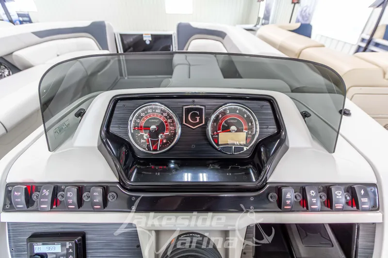 Slide: The Image of Dashboard of 2026 Godfrey Sweetwater 2286 SBC boat with gauges and controls. - 17