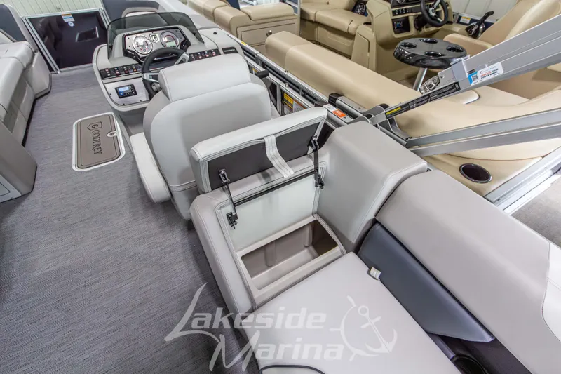 Slide: The Image of Interior of 2026 Godfrey Sweetwater 2286 SBC pontoon boat with seating and storage compartments. - 23