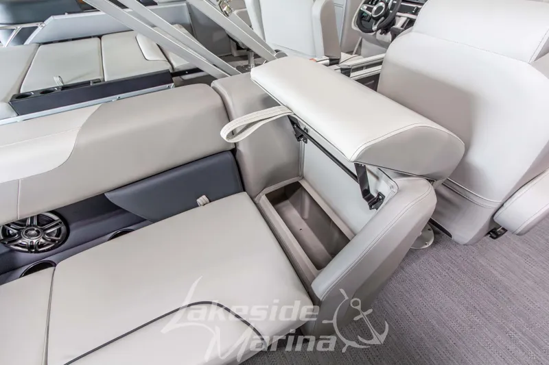 Slide: The Image of Interior of 2026 Godfrey Sweetwater 2286 SBC boat with open storage compartment. - 24