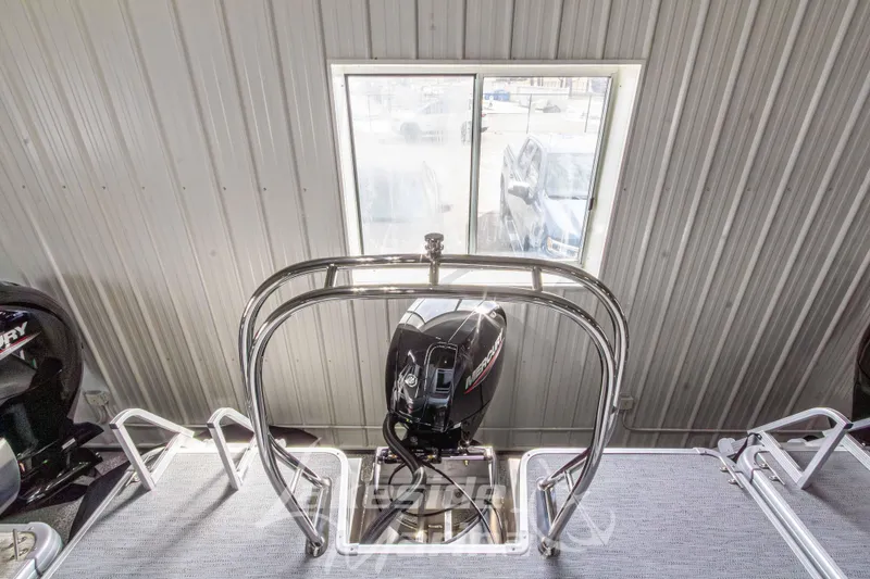 Slide: The Image of 2026 Godfrey Sweetwater 2286 SBC boat with Mercury engine in showroom. - 26