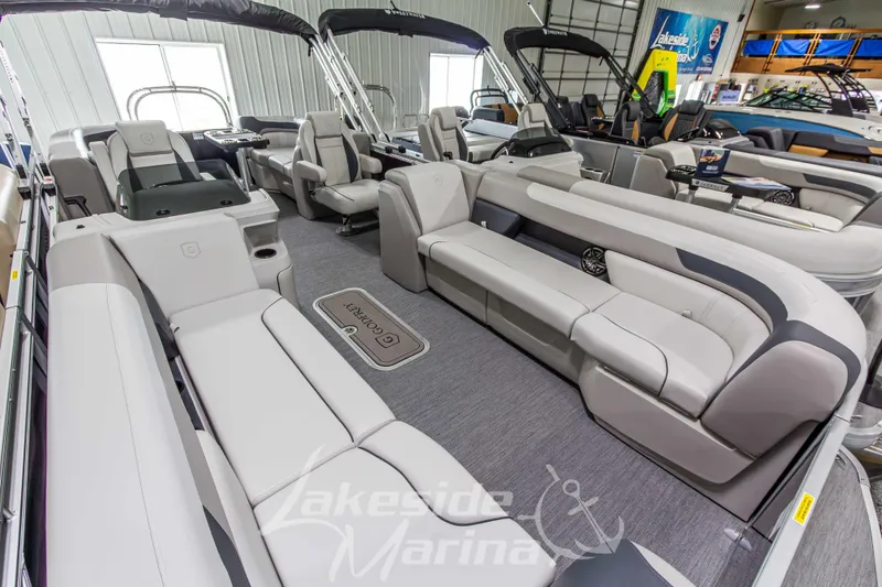Slide: The Image of 2026 Godfrey Sweetwater 2286 SBC pontoon boat interior with luxurious seating at Lakeside Marina. - 4