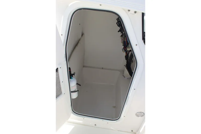 Slide: The Image of Interior storage compartment of 2019 Sea Hunt Ultra 234 boat. - 9