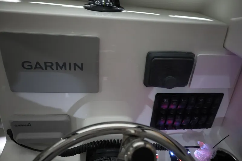 Slide: The Image of Dashboard of 2026 Parker 227 Explorer boat with Garmin navigation system. - 11