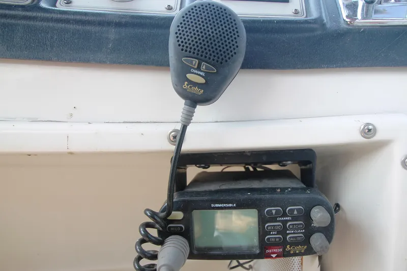 Slide: The Image of Cobra marine radio on 1996 Carver 330 Mariner boat dashboard. - 26