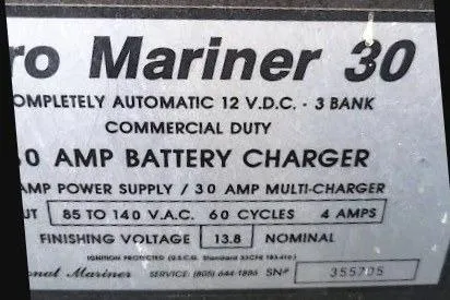Slide: The Image of 1996 Carver 330 Mariner battery charger label, 30 AMP, 12 VDC, commercial duty. - 53
