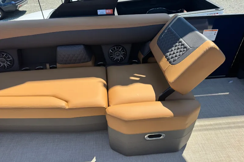 Slide: The Image of The 2027 Harris Sunliner 230 features a luxurious upholstered bench seat with speakers and storage. - 20