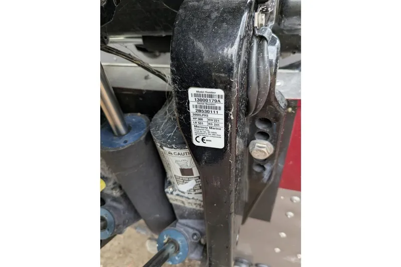 Slide: The Image of Close-up of a 2019 Lund 2175 Pro-V boat component with label details. - 2