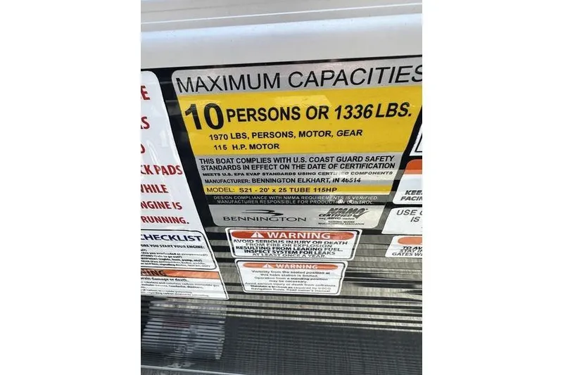 Slide: The Image of Maximum capacity label on 2020 Bennington 21 SL boat, 10 persons or 1336 lbs. - 10