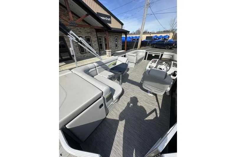 Slide: The Image of 2020 Bennington 21 SL pontoon boat with spacious seating and modern design. - 3
