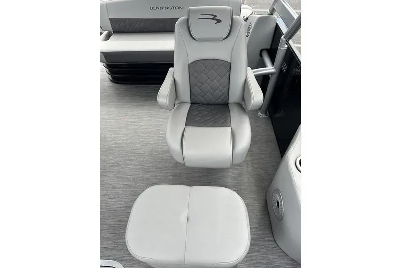 Slide: The Image of Luxurious seating on 2022 Bennington 24 LSBA pontoon boat, featuring premium upholstery. - 13