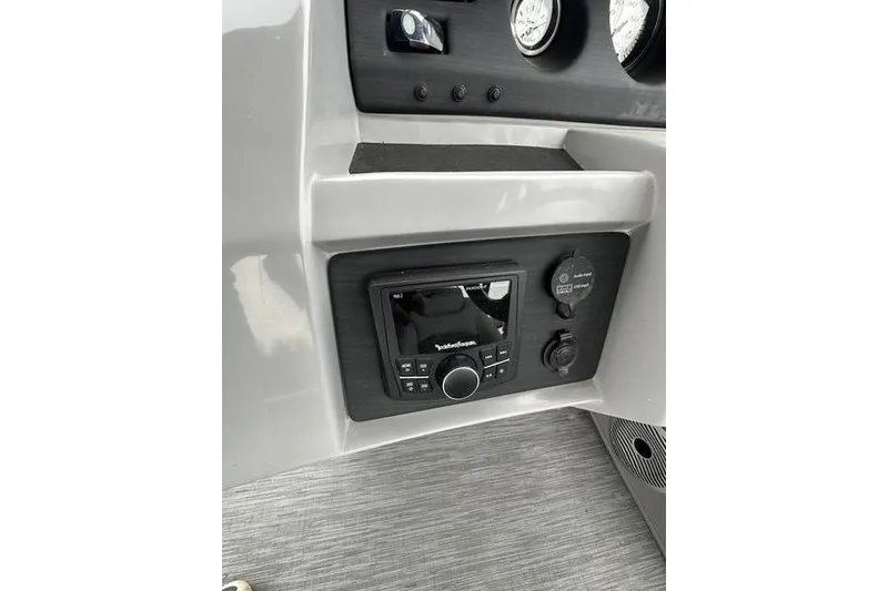 Slide: The Image of Dashboard of 2022 Bennington 24 LSBA boat with Rockford Fosgate audio system. - 19