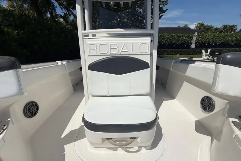 Slide: The Image of 2017 Robalo R242 Center Console boat interior with seating and console details. - 23