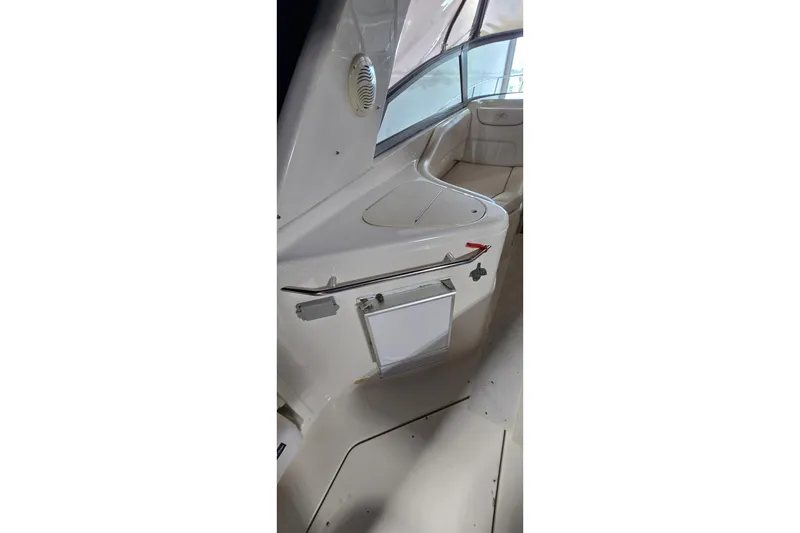 Slide: The Image of Interior view of a 2000 Monetery 302 Express boat, featuring sleek seating and modern design. - 11