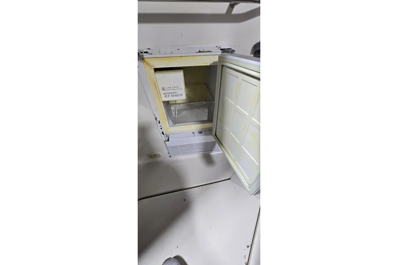 Slide: The Image of Open ice maker in Monetery 302 Express boat, model year 2000. - 13