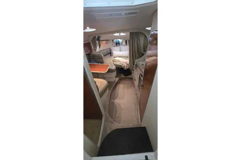 Slide: The Image of Interior of 2000 Monetery 302 Express boat with cozy seating and dining area. - 24