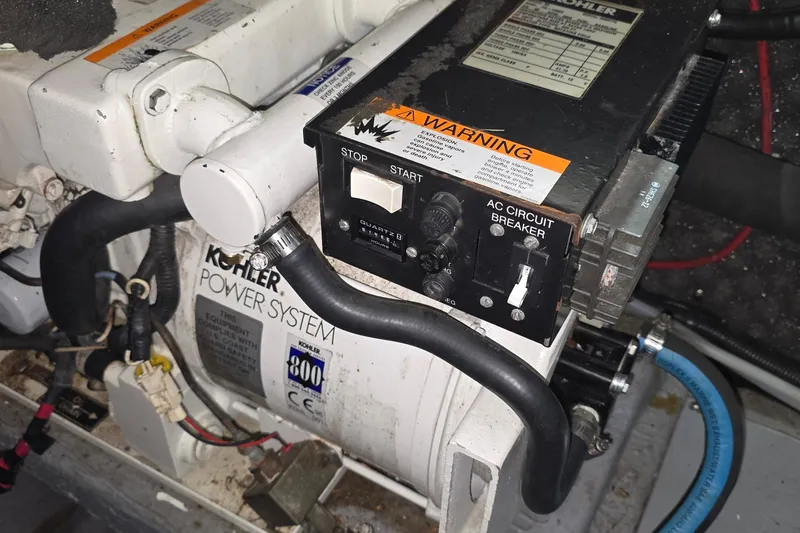 Slide: The Image of Kohler power system with controls and warning label, model Monetery 302 Express, year 2000. - 39