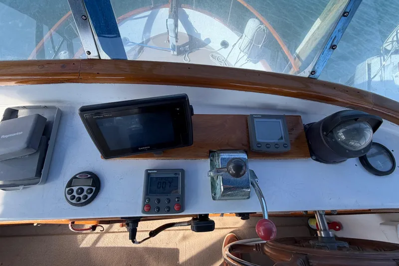 Slide: The Image of Cockpit of 1985 Albin 36 Trawler with navigation instruments and controls. - 15