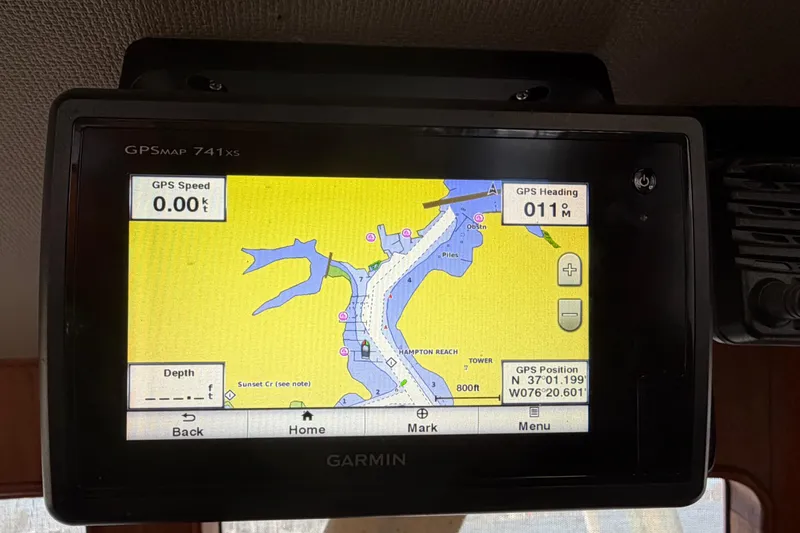 Slide: The Image of Garmin GPS display on 1985 Albin 36 Trawler showing navigation map and coordinates. - 31